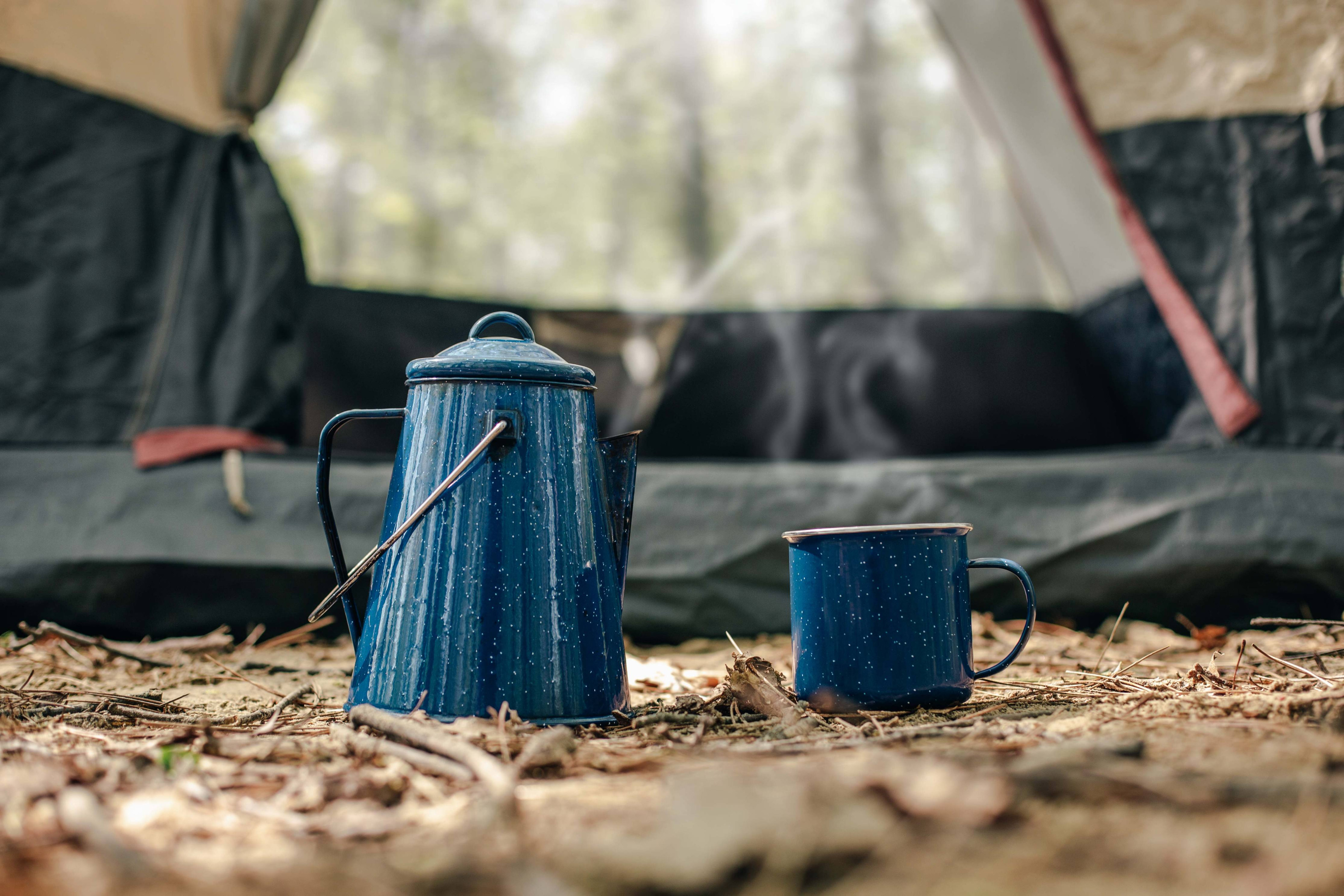 Kettle and cup in campsite